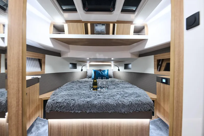 Slide: The Image of Luxurious interior of 2025 Northman 1300 yacht with cozy bed and modern design. - 44