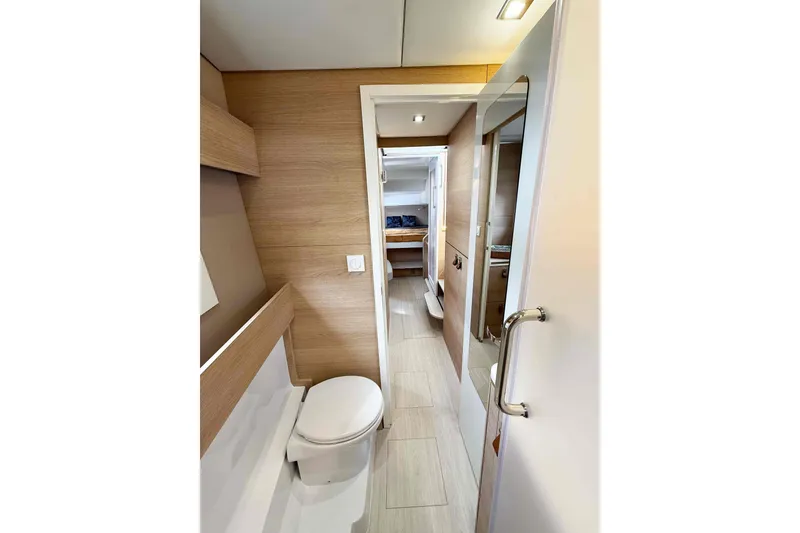 Slide: The Image of Bathroom interior of 2026 Aventura 37 Explorer Trawler, featuring modern design and wood accents. - 23