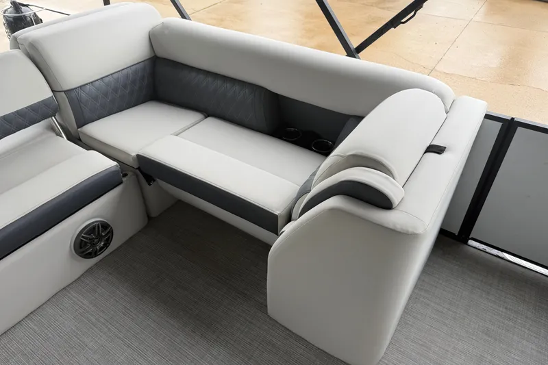 Slide: The Image of Luxurious seating on 2023 Harris Sunliner 230 pontoon boat with cup holders and speaker. - 12