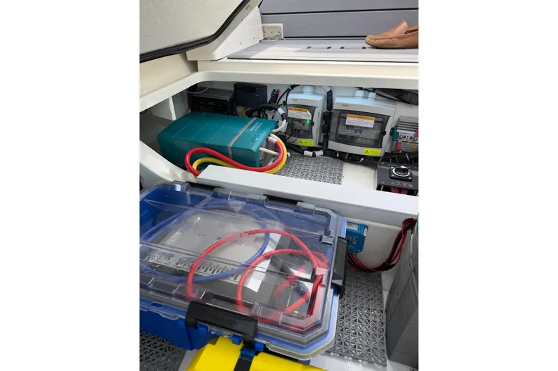 Slide: The Image of Electrical components inside 2025 Saxdor 320 GTC boat, featuring wiring and control systems. - 41