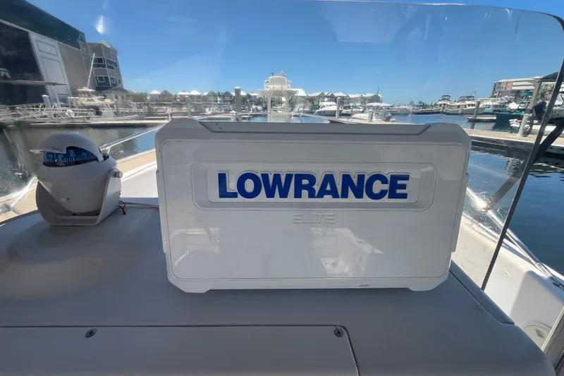 Slide: The Image of 1994 Grady-White Escape 209 boat with Lowrance equipment at marina. - 18