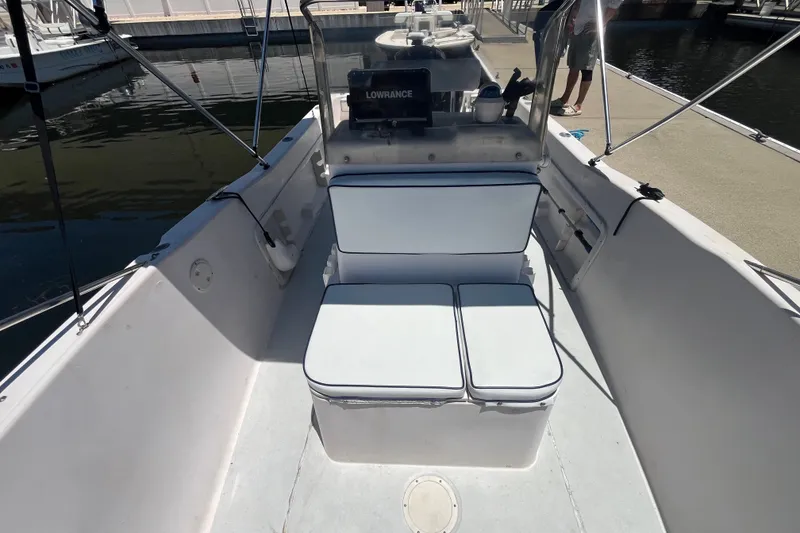 Slide: The Image of 1994 Grady-White Escape 209 boat interior with seating and navigation equipment. - 12