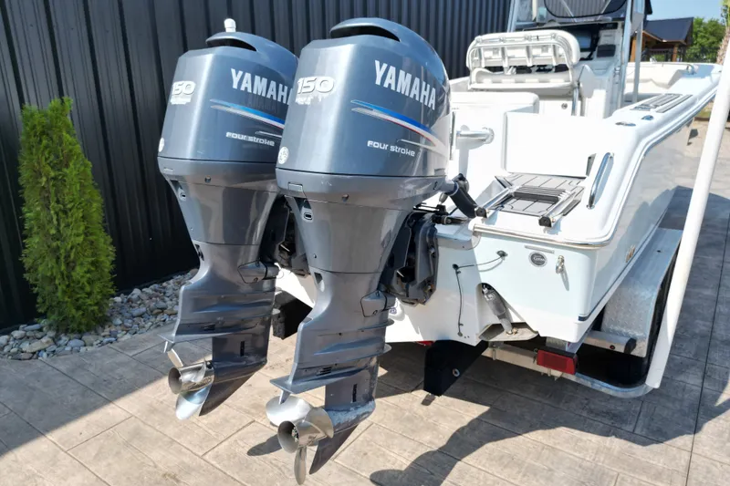 Slide: The Image of 2008 Sea Hunt Triton 260 with twin Yamaha 150 outboard engines. - 9