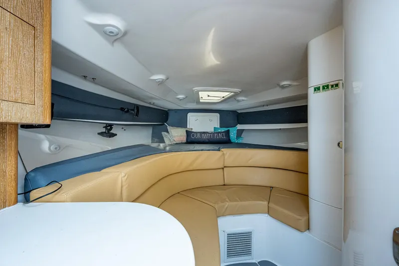 Slide: The Image of Interior of a 2009 Intrepid 370 with beige leather seating and wooden accents. - 5