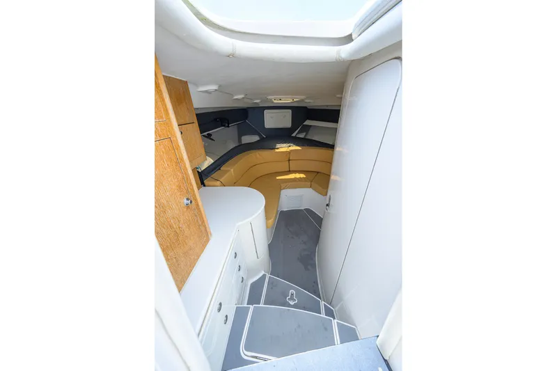 Slide: The Image of Interior cabin of 2009 Intrepid 370 boat with seating and storage. - 20
