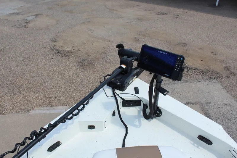Slide: The Image of Bow of 2025 Excel 220 Bay Pro Elite with trolling motor and fish finder. - 17