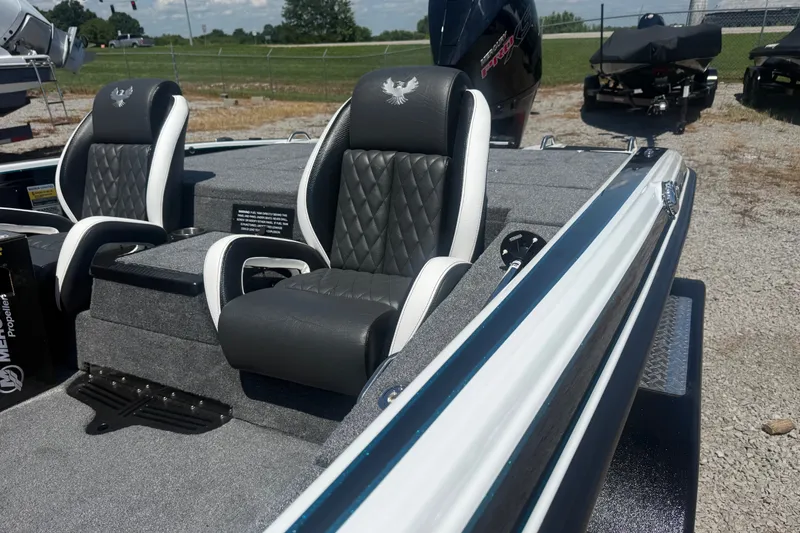 Slide: The Image of 2027 Phoenix 720 ZXL boat interior with luxury seating and sleek design. - 8