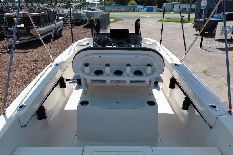 Slide: The Image of 2020 Bayliner Trophy T20CC boat interior with seating and rod holders. - 31