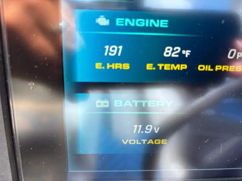 Slide: The Image of The display shows engine data such as hours, temperature, and battery voltage. - 15