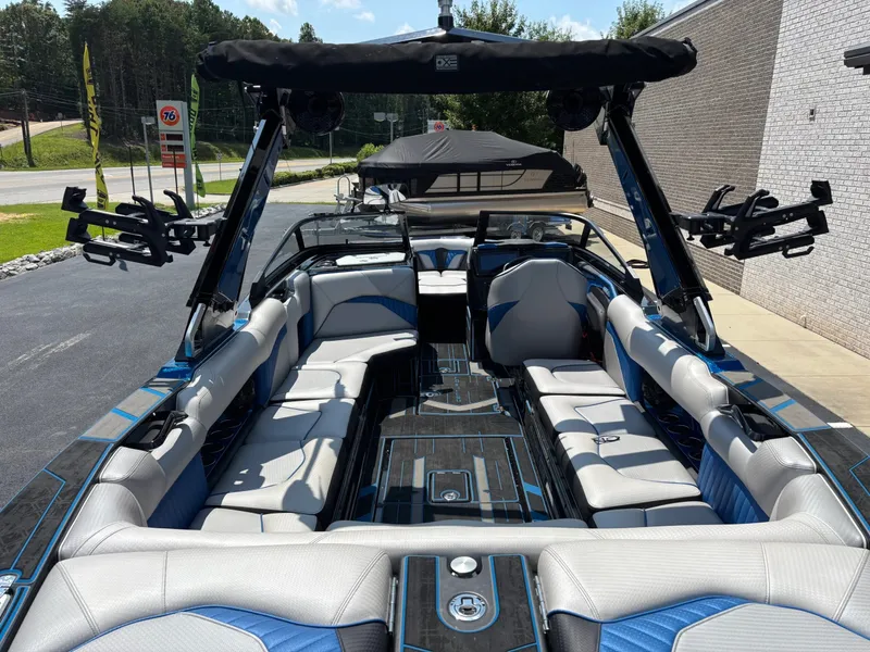 Slide: The Image of 2023 Centurion Fi25 with a luxurious, spacious interior and modern seating, perfect for watersports. - 8