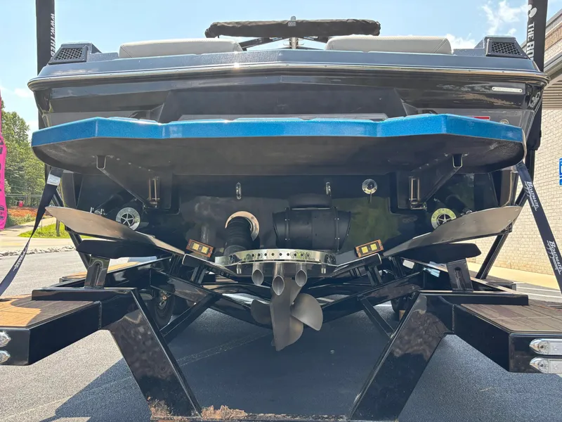Slide: The Image of The image shows the rear of a 2023 Centurion Fi25 with visible drive and propeller. - 6