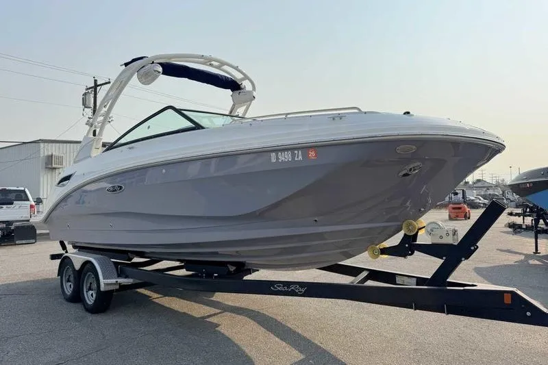 Slide: The Image of 2022 Sea Ray SDX 250 boat on trailer, parked outdoors. - 5
