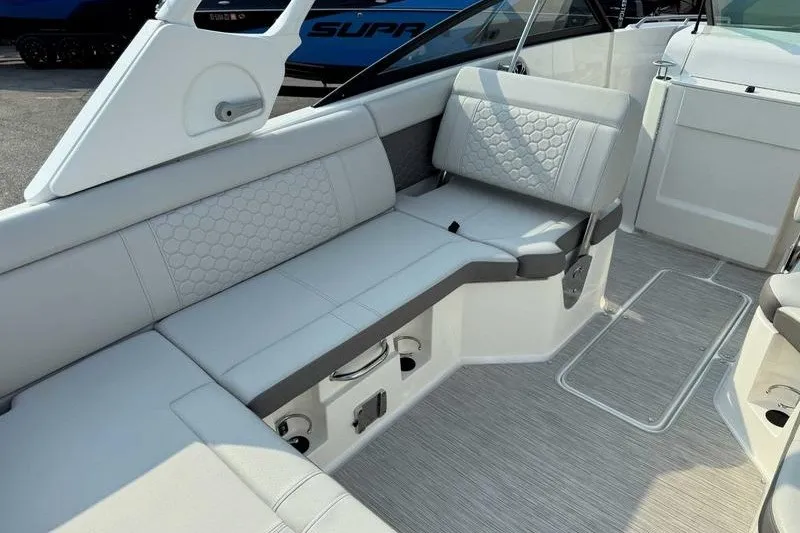 Slide: The Image of 2022 Sea Ray SDX 250 boat interior with luxurious seating and modern design. - 7