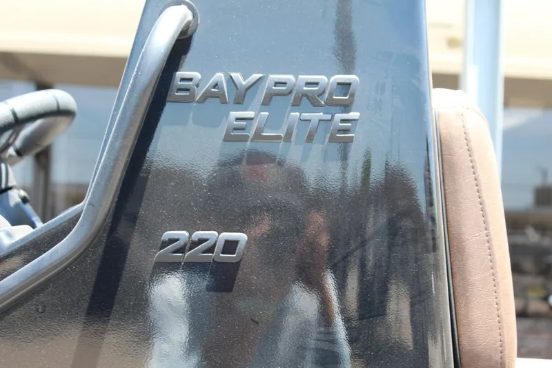 Slide: The Image of Close-up of 2027 Excel 220 Bay Pro Elite boat logo. - 9