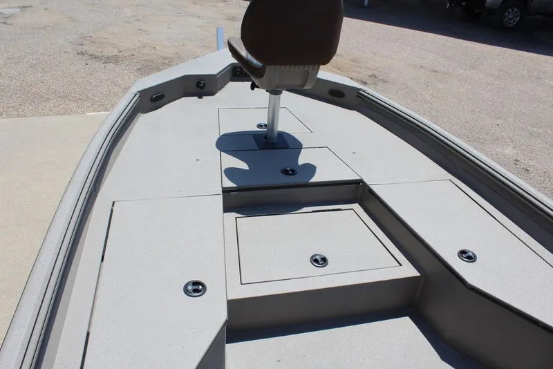 Slide: The Image of 2027 Excel 220 Bay Pro Elite boat deck with seating and storage compartments. - 11