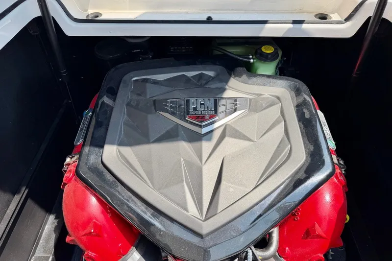Slide: The Image of 2023 Nautique Super Air Nautique S23 engine compartment with PCM engine cover. - 29