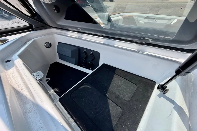Slide: The Image of 2023 Nautique Super Air Nautique S23 storage compartment with sleek design and modern features. - 20