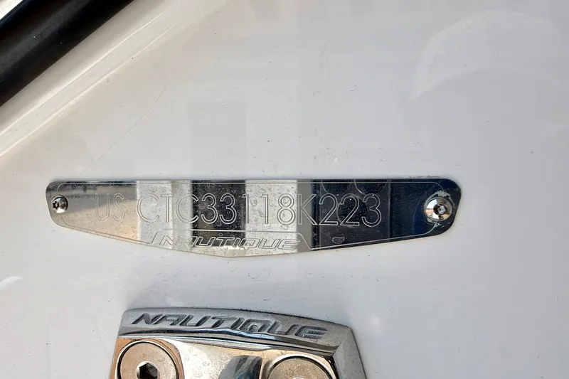 Slide: The Image of 2023 Nautique Super Air Nautique S23 identification plate with serial number. - 30