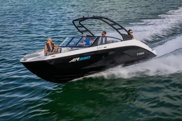 Slide: The Image of 2026 Yamaha Boats AR220 speeding on water with passengers enjoying the ride. - 10