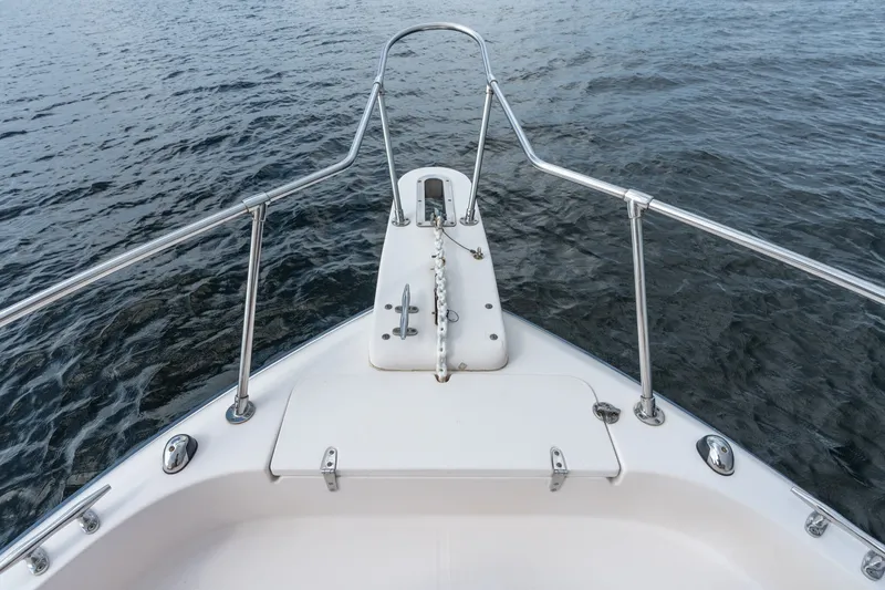 Slide: The Image of Bow view of 2006 Grady-White Gulfstream 232 boat on water. - 24