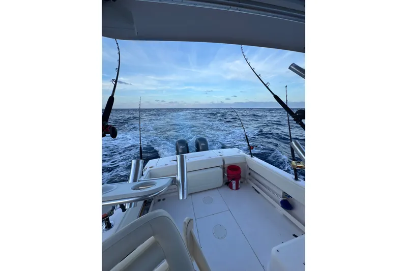 Slide: The Image of 2006 Grady-White Gulfstream 232 boat with fishing rods on open sea. - 6