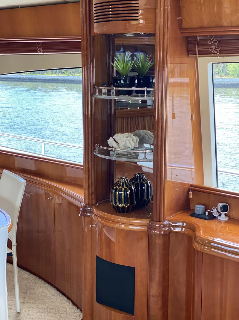 Slide: The Image of Luxurious interior of 1999 Azimut 85 Ultimate yacht with elegant wood finish and decor. - 20