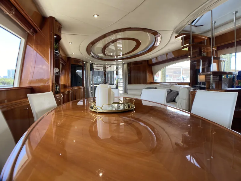 Slide: The Image of Luxurious interior of 1999 Azimut 85 Ultimate yacht with elegant wood finishes and modern design. - 8