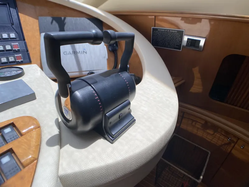 Slide: The Image of Control panel of a 1999 Azimut 85 Ultimate yacht with Garmin navigation system. - 30