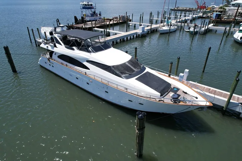 Slide: The Image of Luxury 1999 Azimut 85 Ultimate yacht docked at marina, aerial view. - 110