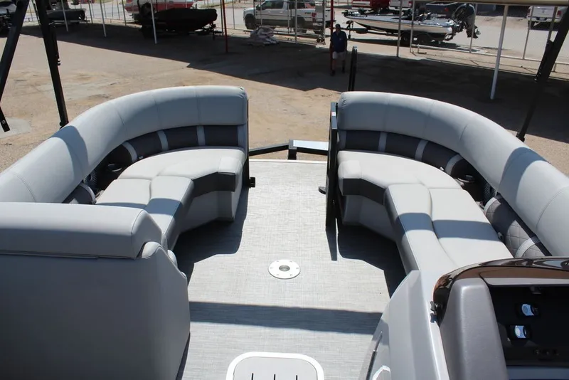 Slide: The Image of 2023 Bennington 23 LSR pontoon boat with spacious gray seating and modern design. - 18