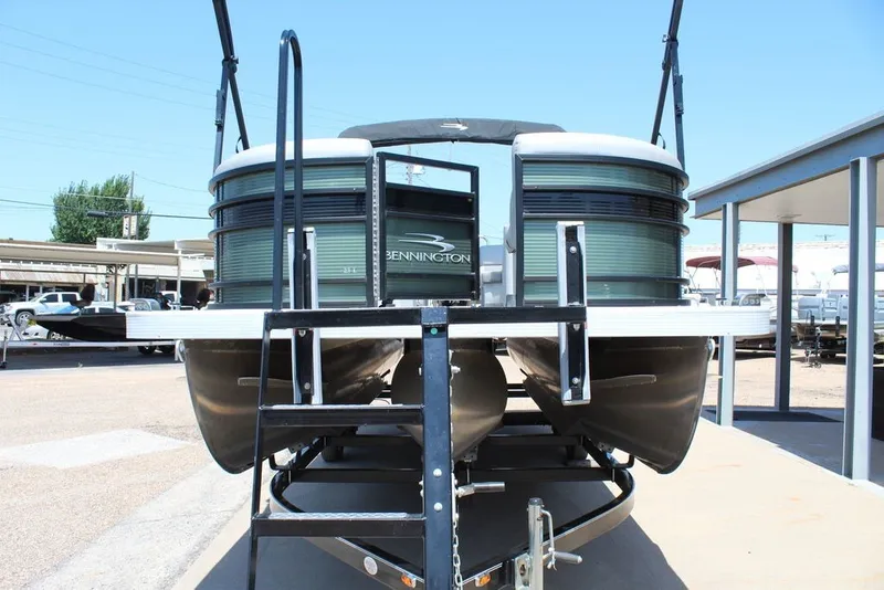 Slide: The Image of 2023 Bennington 23 LSR pontoon boat on trailer, front view. - 17