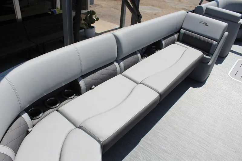 Slide: The Image of Luxurious seating on 2023 Bennington 23 LSR pontoon boat with cup holders. - 10