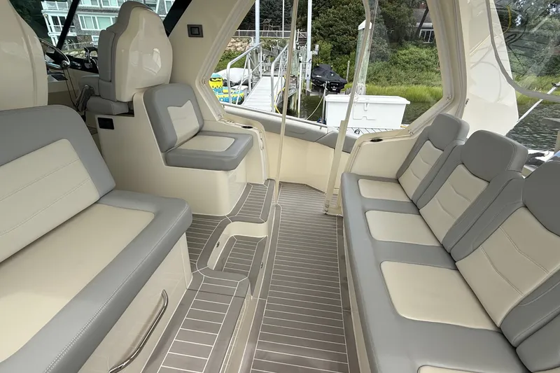 Slide: The Image of Luxurious interior of 2021 Scout 530 LXF boat with spacious seating and elegant design. - 17