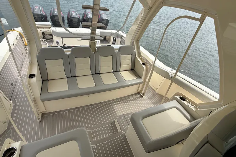 Slide: The Image of Luxurious interior of 2021 Scout 530 LXF boat with comfortable seating and modern design. - 14