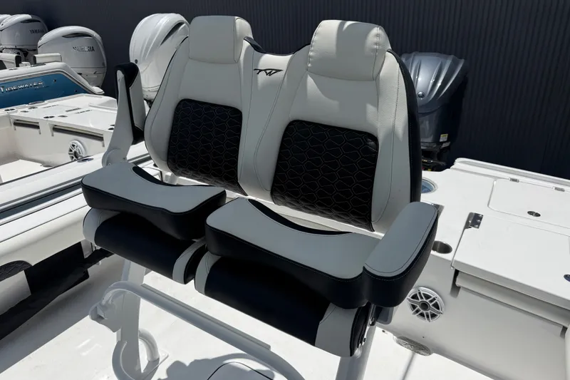Slide: The Image of Luxury seating on 2027 Tidewater 2500 Carolina Bay boat with Yamaha engines. - 8