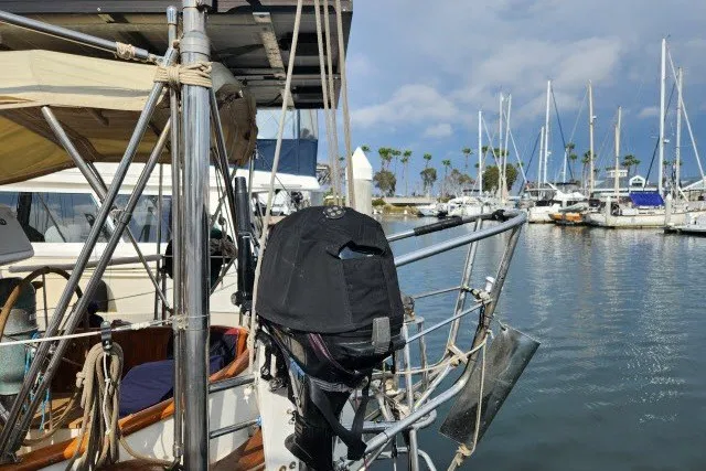 Slide: The Image of 1979 Hans Christian 38 Traditional sailboat docked in a marina with clear skies. - 46