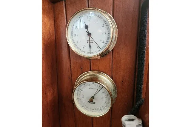 Slide: The Image of Brass clock and barometer on wooden panel, Hans Christian 38 Traditional, 1979. - 35