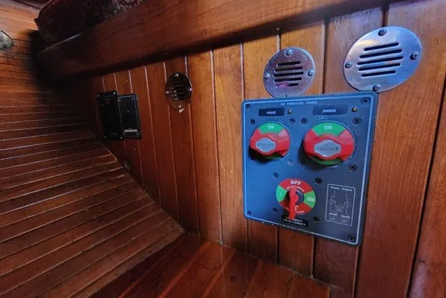 Slide: The Image of Electrical panel on 1979 Hans Christian 38 Traditional sailboat with wooden interior. - 37