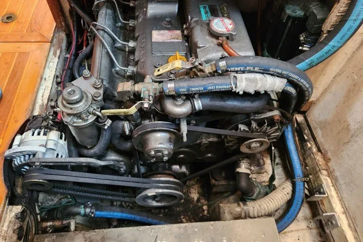 Slide: The Image of Engine compartment of a 1979 Hans Christian 38 Traditional sailboat, showcasing mechanical components. - 40