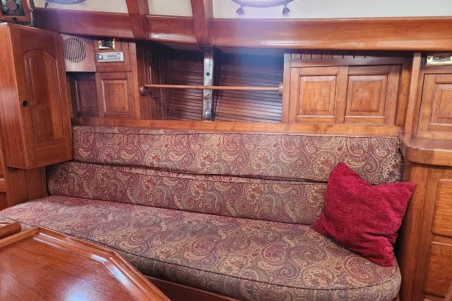 Slide: The Image of Cozy interior of 1979 Hans Christian 38 Traditional sailboat with patterned upholstery. - 22