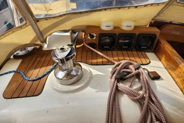 Slide: The Image of Cockpit of 1979 Hans Christian 38 Traditional sailboat with winch and ropes. - 50