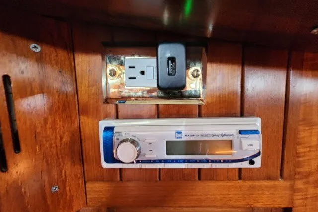 Slide: The Image of 1979 Hans Christian 38 Traditional boat interior with stereo and power outlet. - 34