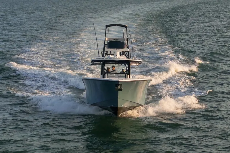 The Image of 2025 Yellowfin 42 Offshore boat cruising on open water, creating a wake. - 9