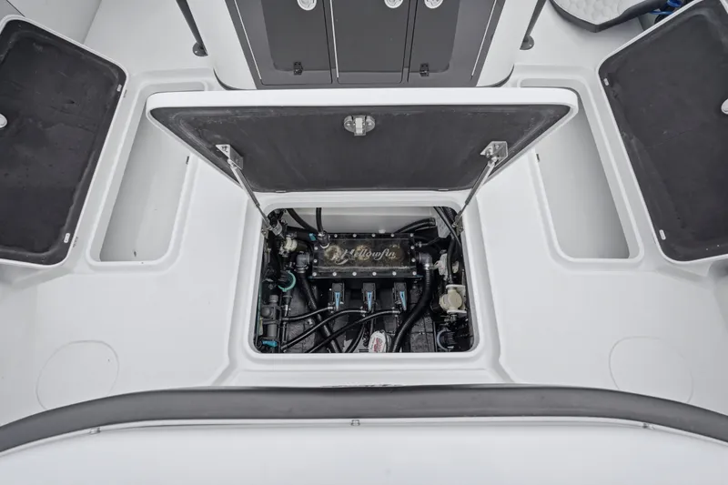 Slide: The Image of 2025 Yellowfin 42 Offshore boat showing open hatch with internal components. - 57