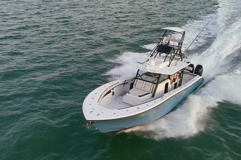 Slide: The Image of 2025 Yellowfin 42 Offshore boat cruising on open water, showcasing sleek design and performance. - 17