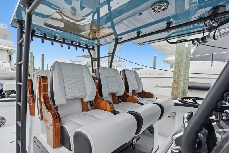 Slide: The Image of Interior of 2025 Yellowfin 42 Offshore boat with luxurious seating and modern design. - 35