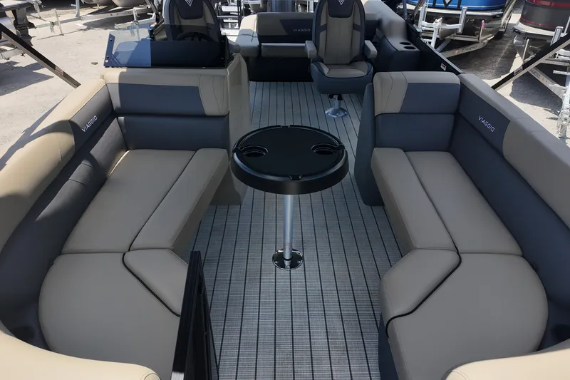 Slide: The Image of Luxurious interior of 2027 Viaggio V22S pontoon boat with plush seating and table. - 10