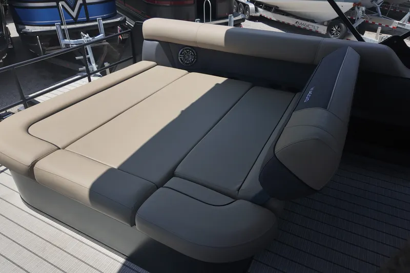 Slide: The Image of Luxurious seating on 2027 Viaggio V22S boat, featuring beige upholstery and modern design. - 14