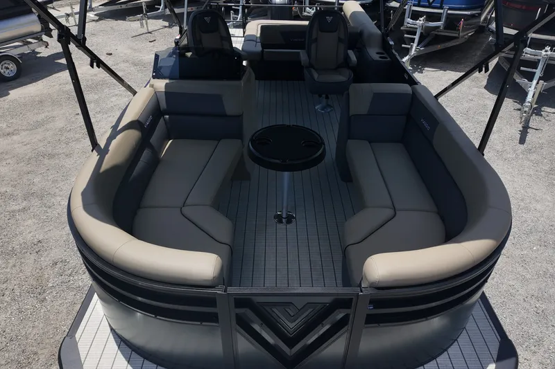 Slide: The Image of Luxurious 2027 Viaggio V22S pontoon boat interior with plush seating and central table. - 6