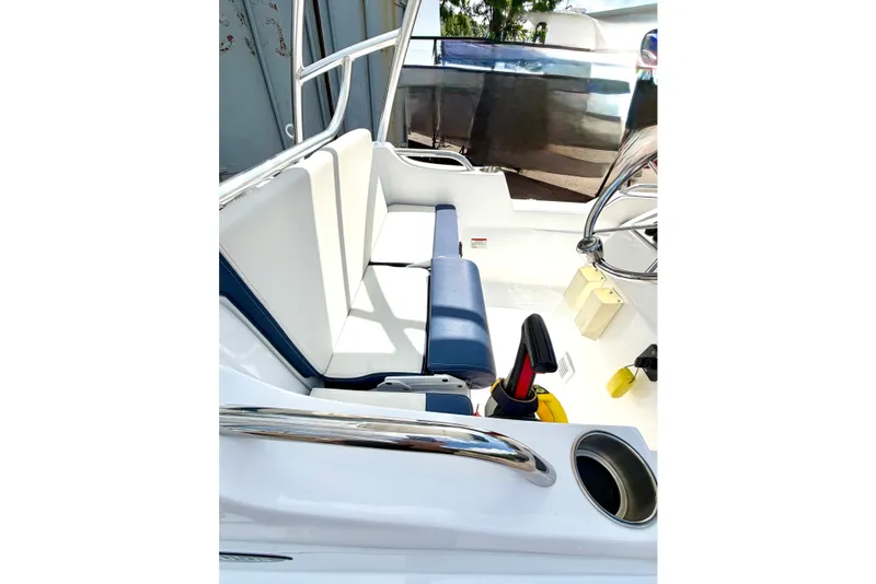 Slide: The Image of 2023 AB Inflatables Nautilus 14 DLX boat interior with blue and white seating. - 13
